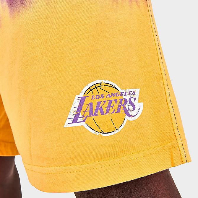 On Model 5 view of Men's Mitchell & Ness Los Angeles Lakers NBA Tie-Dye Fleece Shorts in Yellow/Purple Click to zoom