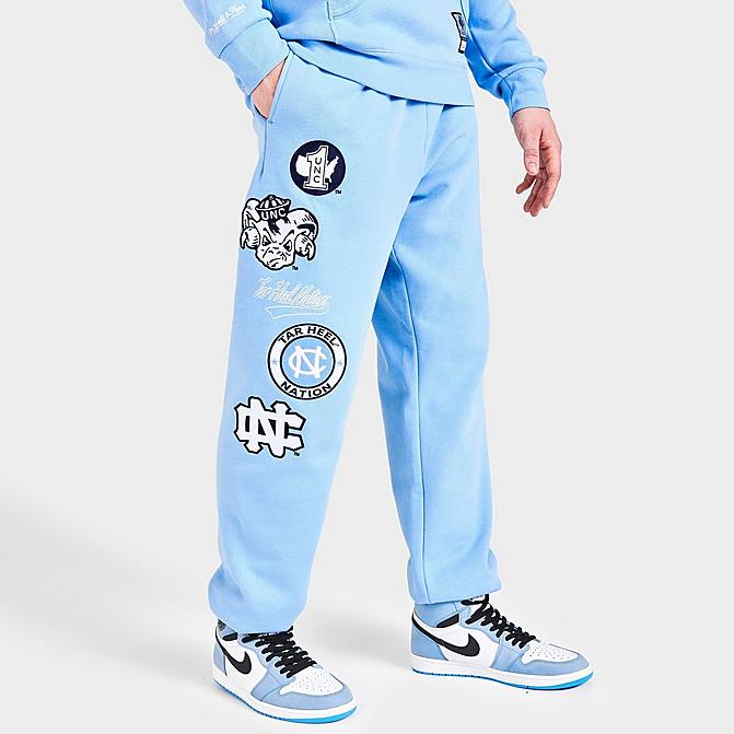 Front view of Men's Mitchell & Ness University of North Carolina Tar Heels College Champs Jogger Pants in Carolina Blue Click to zoom