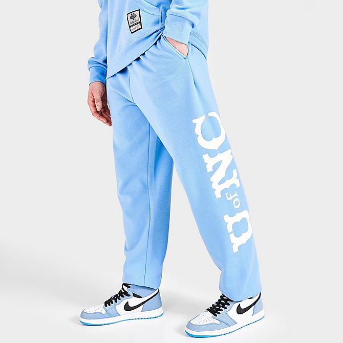 Back Left view of Men's Mitchell & Ness University of North Carolina Tar Heels College Champs Jogger Pants in Carolina Blue Click to zoom