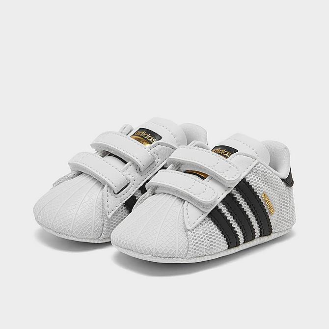 Three Quarter view of Infant adidas Originals Superstar Crib Shoes in Cloud White/Core Black/Cloud White Click to zoom