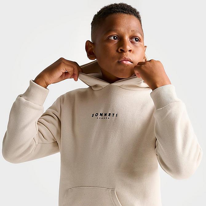 On Model 5 view of Kids' Sonneti London Pullover Hoodie in Ancient Scroll Beige Click to zoom
