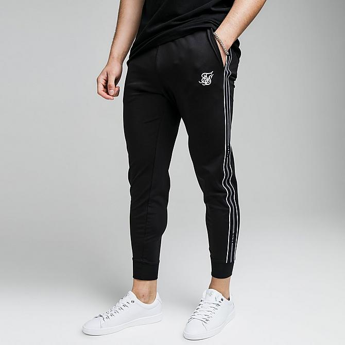 Front Three Quarter view of Men's SikSilk Status Taped Jogger Pants in Black Click to zoom