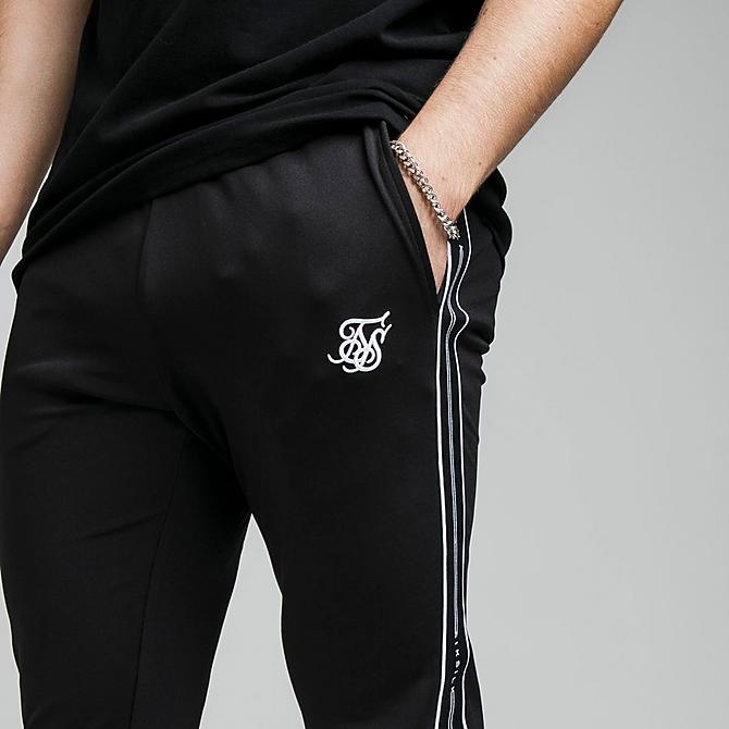 On Model 6 view of Men's SikSilk Status Taped Jogger Pants in Black Click to zoom