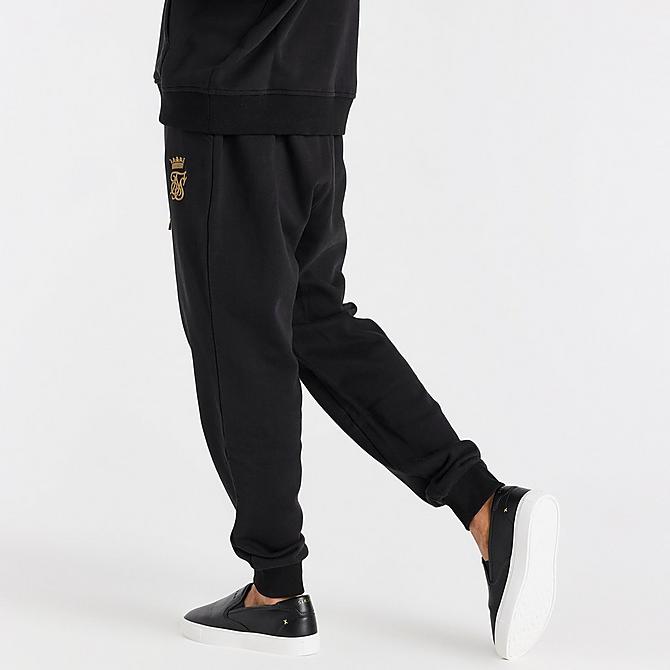 Back Right view of Men's Messi x SikSilk Fleece Jogger Pants in Black/Gold Click to zoom