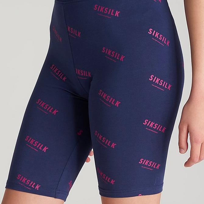 On Model 5 view of Girls' SikSilk Allover Print Bike Shorts in Navy Click to zoom