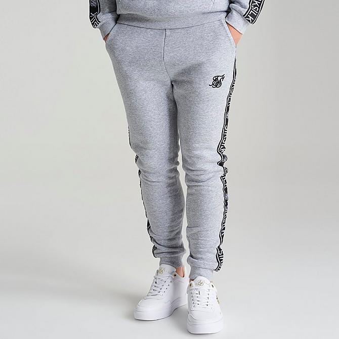 On Model 5 view of Boys' SikSilk Fleece Tape Logo Track Suit in Grey/Black/White Click to zoom