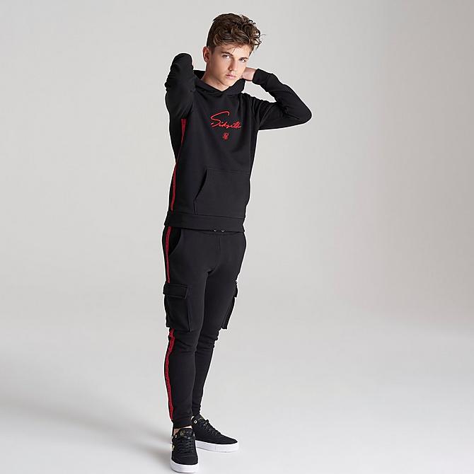 Front Three Quarter view of Boys' SikSilk Flight Hoodie in Black/Red Click to zoom