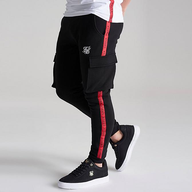 Front view of Boys' SikSilk Flight Jogger Pants in Black/Red Click to zoom