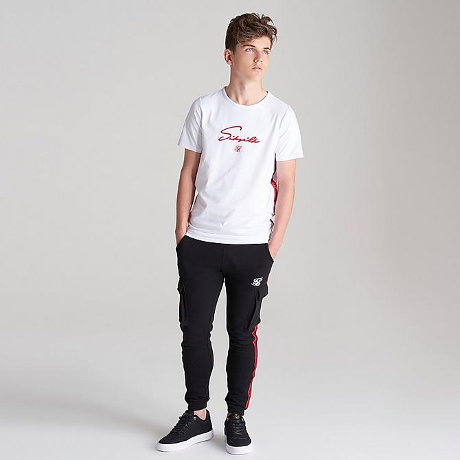 Front Three Quarter view of Boys' SikSilk Flight Jogger Pants in Black/Red Click to zoom