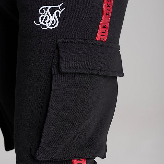 On Model 6 view of Boys' SikSilk Flight Jogger Pants in Black/Red Click to zoom