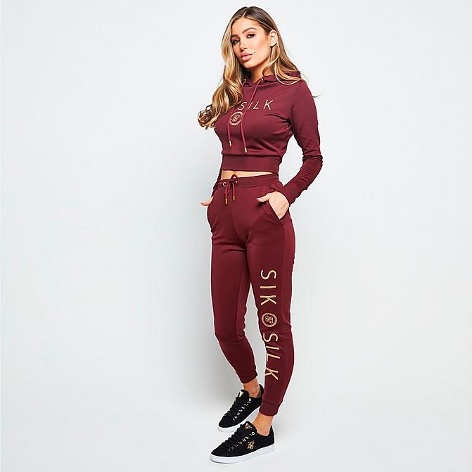 Front view of Women's SikSilk Eyelet Mesh Track Jogger Pants in Burgundy Click to zoom