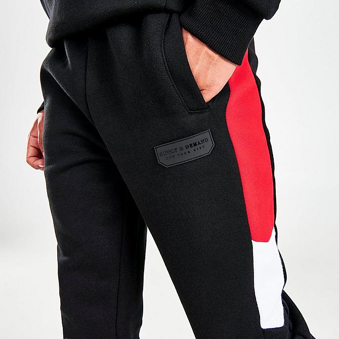 On Model 6 view of Boys' Supply & Demand Walker Jogger Pants in Black/Red/White Click to zoom