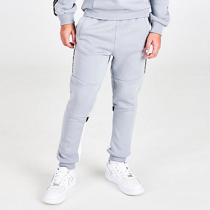 Front Three Quarter view of Boys' Supply & Demand Stripe Taped Colorblock Jogger Pants in Light Grey Click to zoom