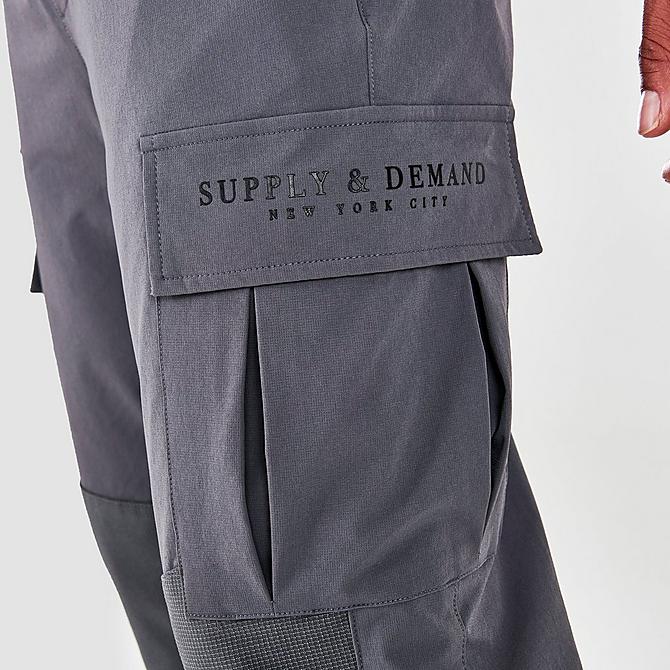 On Model 5 view of Men's Supply & Demand Oxy Cargo Pants in Dark Grey Click to zoom