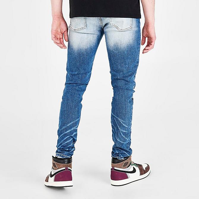 Back Right view of Men's Supply & Demand Paint Splatter Jeans in Indigo Click to zoom