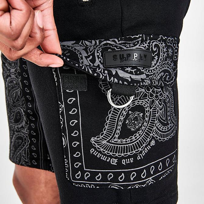On Model 6 view of Men's Supply & Demand Dropper Woven Cargo Shorts in Black Click to zoom