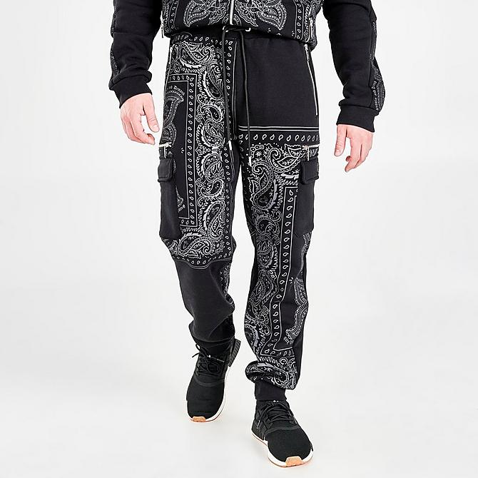Front Three Quarter view of Men's Supply & Demand Dropper Woven Cargo Pants in Black Click to zoom