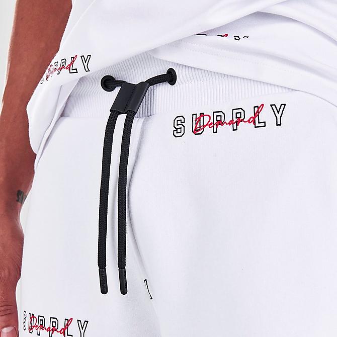 On Model 5 view of Men's Supply & Demand Spritz All-Over Print Shorts in White Click to zoom