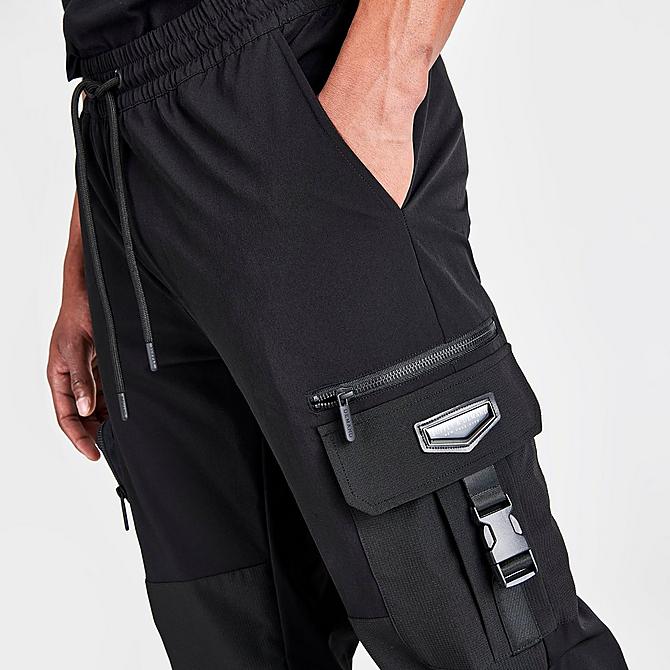 On Model 5 view of Men's Supply & Demand Sniper Cargo Pants in Black Click to zoom