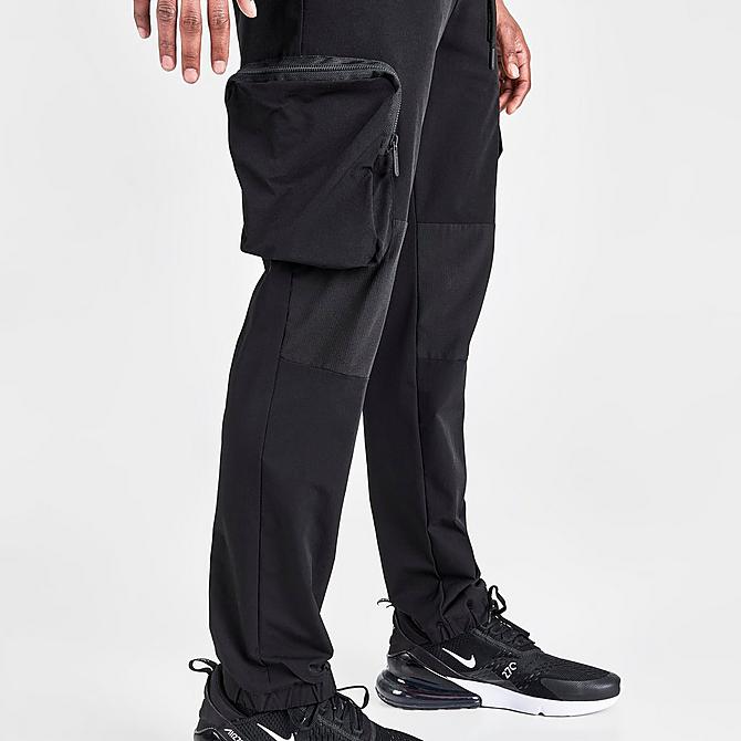 On Model 6 view of Men's Supply & Demand Sniper Cargo Pants in Black Click to zoom
