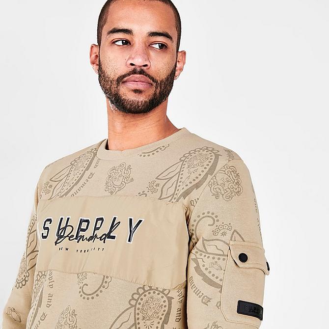 On Model 5 view of Men's Supply & Demand Paisley Spray Crewneck Sweatshirt in Tan/White Click to zoom