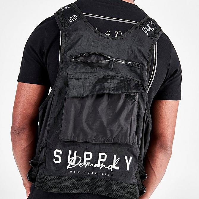 On Model 6 view of Men's Supply & Demand Acid Cargo Tactical Vest in Black Click to zoom