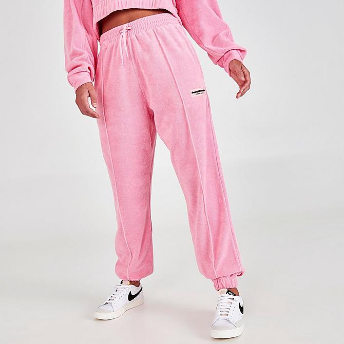 Front Three Quarter view of Women's Supply & Demand Towelling Jogger Sweatpants in Mid Pink Click to zoom
