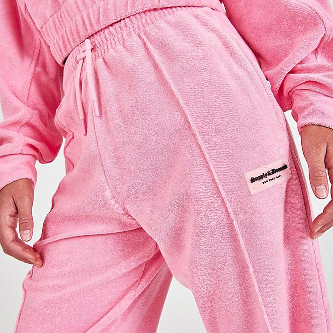 On Model 5 view of Women's Supply & Demand Towelling Jogger Sweatpants in Mid Pink Click to zoom