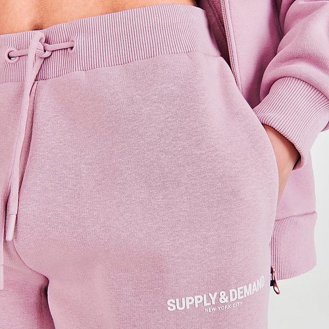 On Model 5 view of Women's Supply & Demand Logo Joggers in Pink Click to zoom