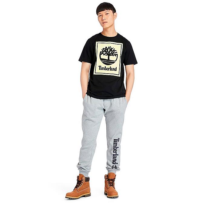Front Three Quarter view of Men's Timberland Stack Logo T-Shirt in Black/White Click to zoom