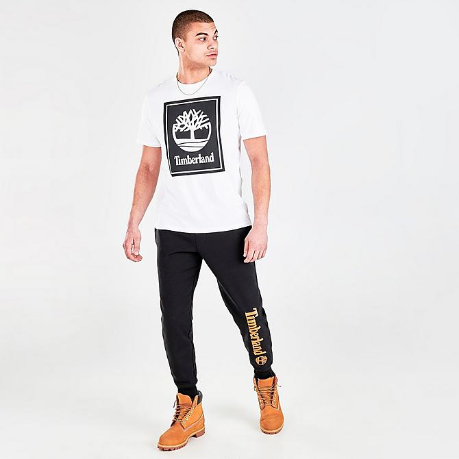 Front Three Quarter view of Men's Timberland Stack Logo Graphic Print Short-Sleeve T-Shirt in White Click to zoom