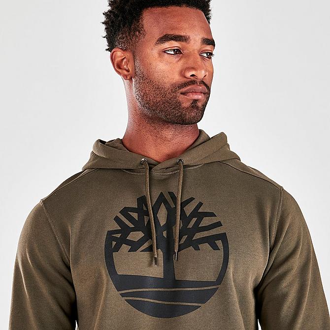 On Model 5 view of Men's Timberland Tree Logo Pullover Hoodie in Olive Green/Black Click to zoom