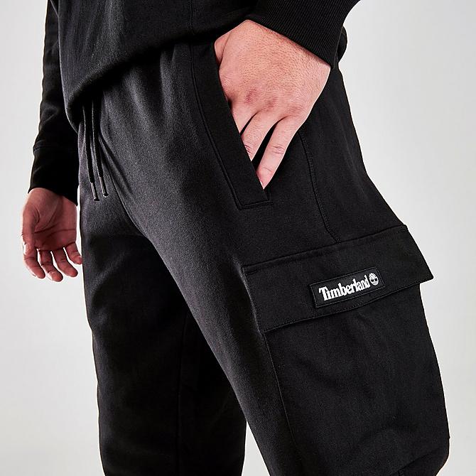 On Model 5 view of Men's Timberland Cargo Jogger Pants in TNF Black Click to zoom