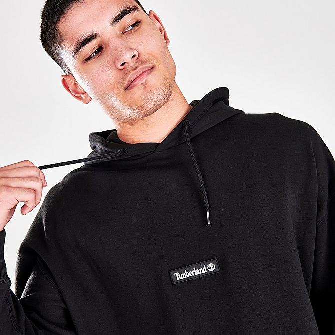 On Model 5 view of Men's Timberland Cargo Pullover Hoodie in Black Click to zoom