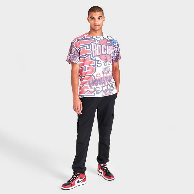 Front Three Quarter view of Men's Mitchell & Ness Houston Rockets NBA Jumbotron T-Shirt in Blue/Red Click to zoom
