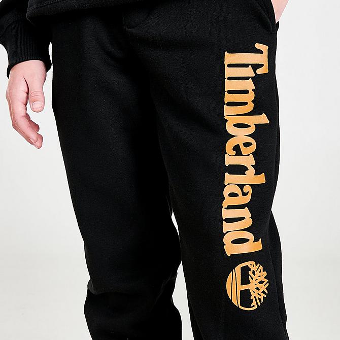 On Model 5 view of Boys' Timberland Script Logo Jogger Pants in Black Click to zoom