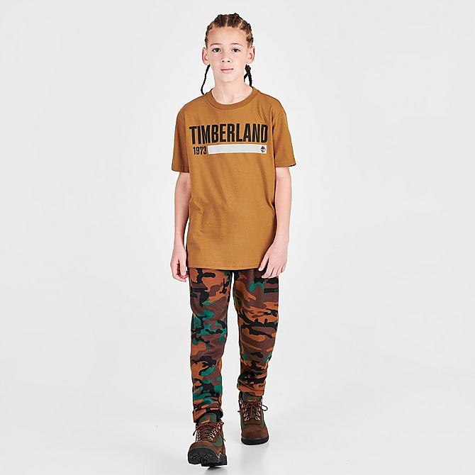 Front Three Quarter view of Kids' Timberland Work Logo T-Shirt in Wheat Click to zoom