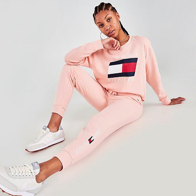 Front view of Women's Tommy Hilfiger Printed Logo Jogger Pants in Tropical Peach Click to zoom