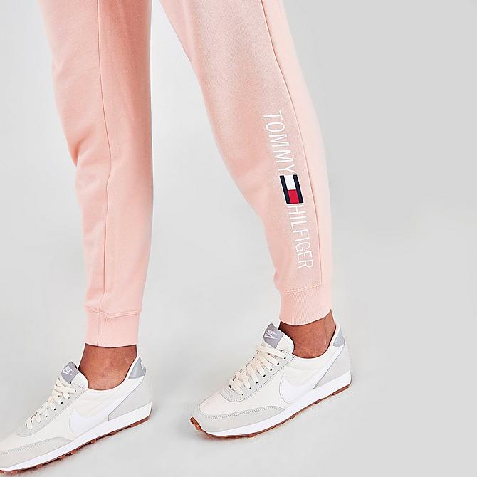 On Model 6 view of Women's Tommy Hilfiger Printed Logo Jogger Pants in Tropical Peach Click to zoom