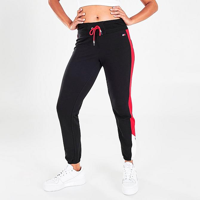 Front Three Quarter view of Women's Tommy Hilfiger Slant Jogger Pants in Black/Red/White Click to zoom