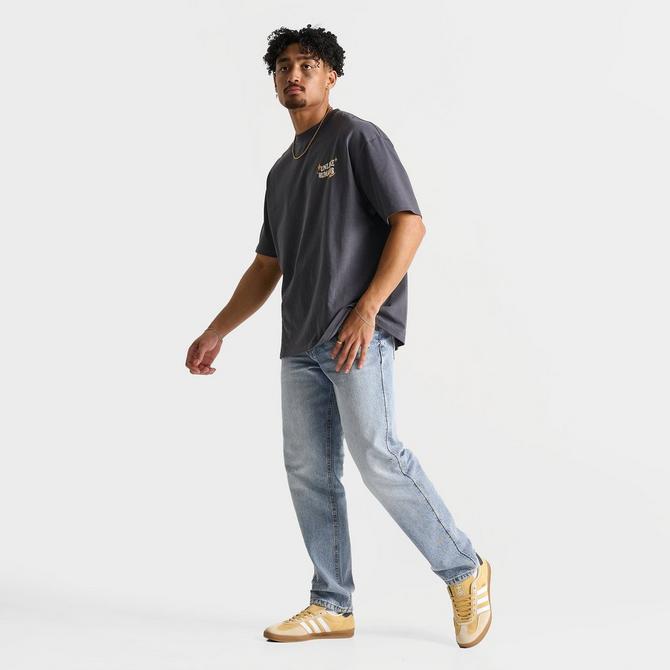 [angle] view of Men's Unlike Humans Cason Relaxed Denim Jeans in Light Blue Click to zoom