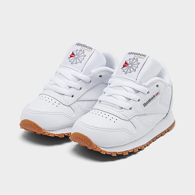 Three Quarter view of Kids' Toddler Reebok Classic Leather Lace-Up Casual Shoes in White/Gum Click to zoom
