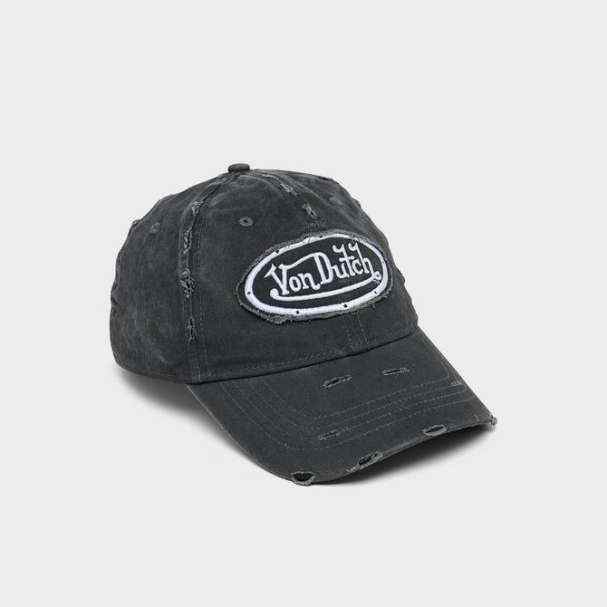 Left view of Von Dutch Busted Dad Strapback Hat in Washed Black Click to zoom
