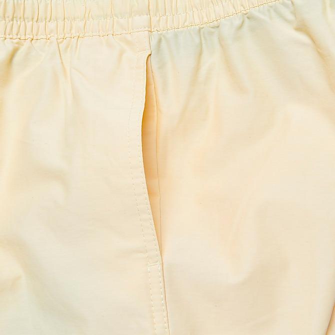 On Model 5 view of Boys' Vans Primary 15.5" Volley Shorts in Pale Banana Click to zoom