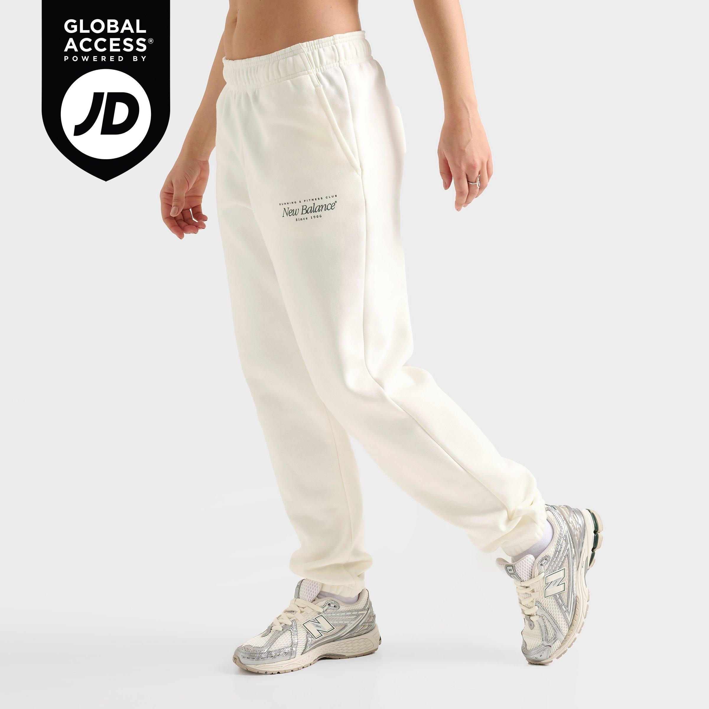 ★★New Balance★★ NBMLF1V212 WOMEN Essential Jogger Pants Women's New Balance Logo Cuffed Jogger Pants | Finish Line