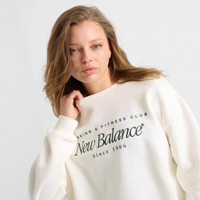 [angle] view of Women's New Balance Logo Crewneck Sweatshirt in Salt/Spruce Click to zoom