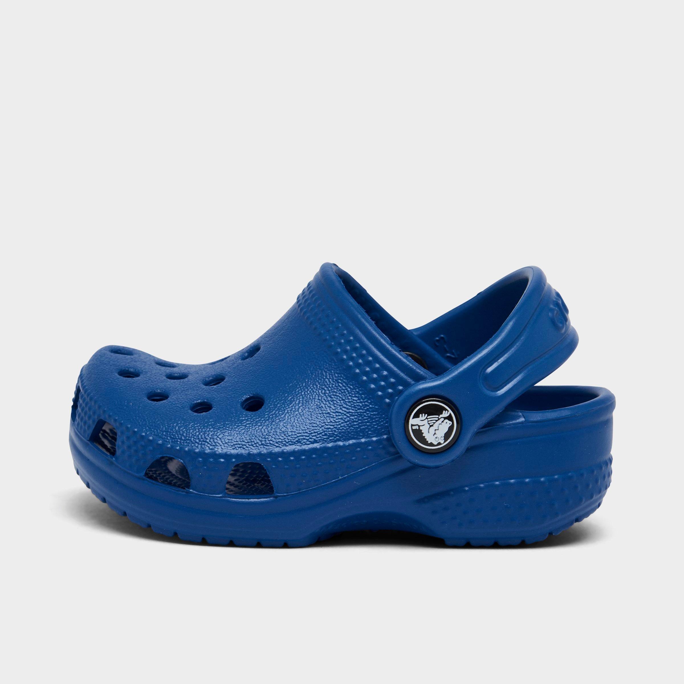 Shop Crocs Infant Littles ™ Crib Classic Clogs Shoes In Blue Bolt
