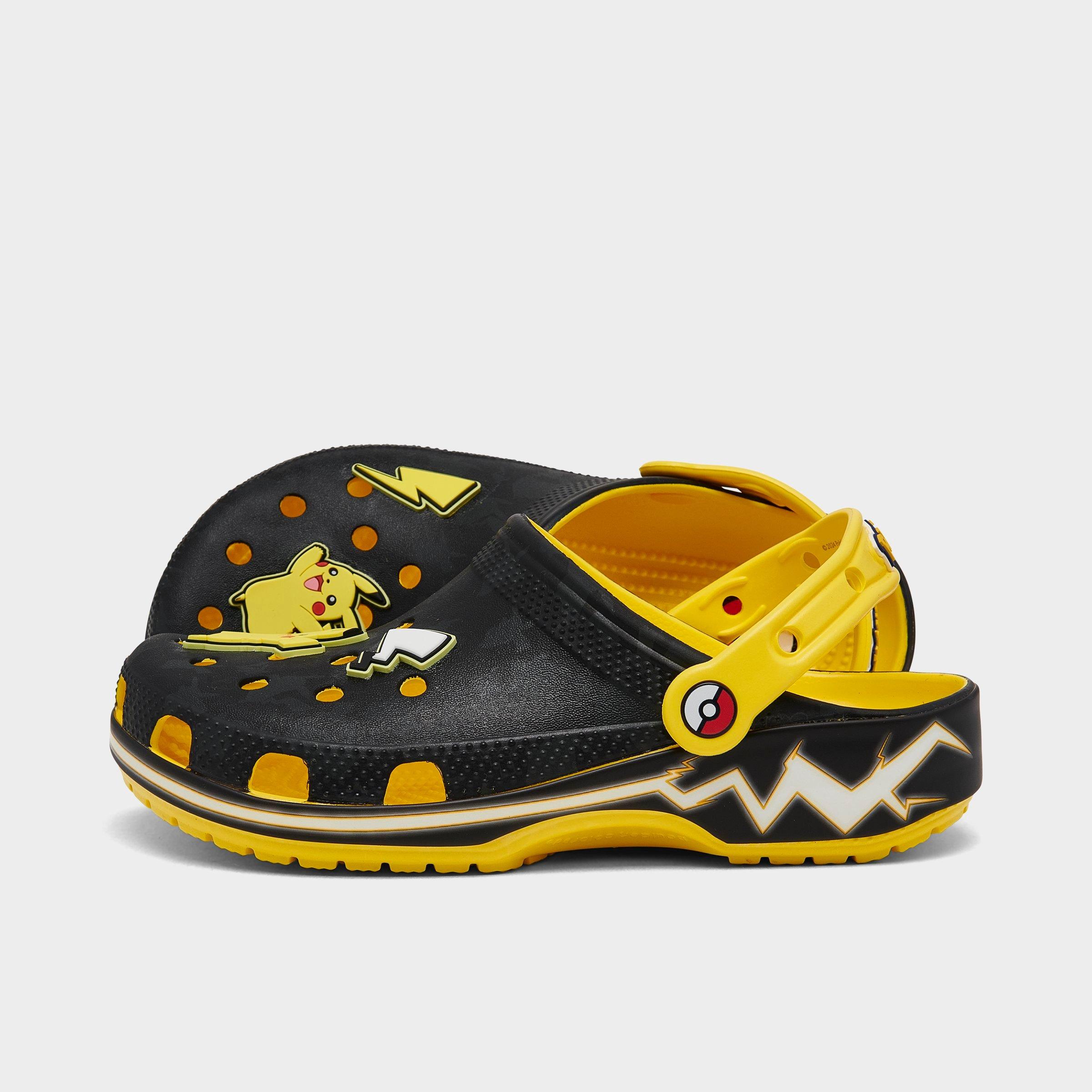 Shop Crocs Big Kids' X Pokemon Pikachu Classic Clog Shoes In Black/lemon