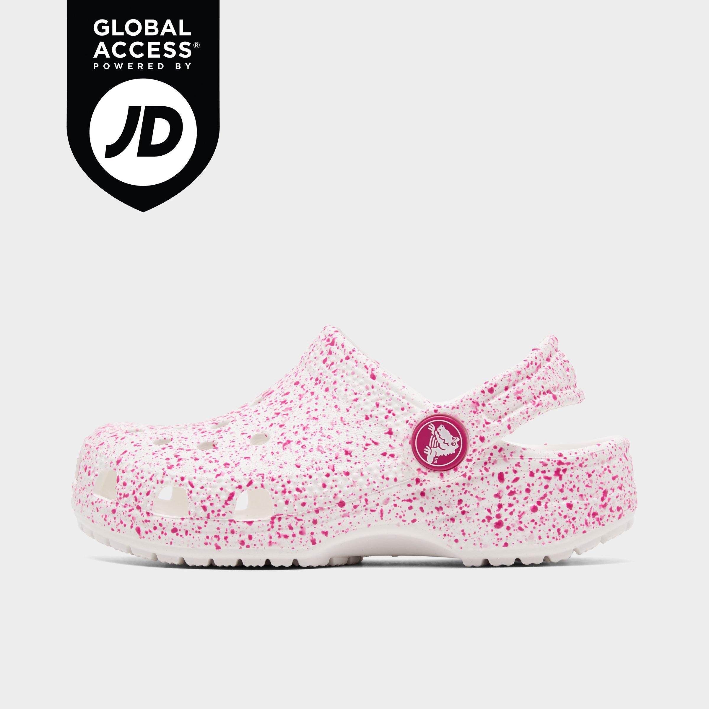 Crocs Girls' Toddler Paint Splatter Classic Clog Shoes in White/Pink Size: 4.0