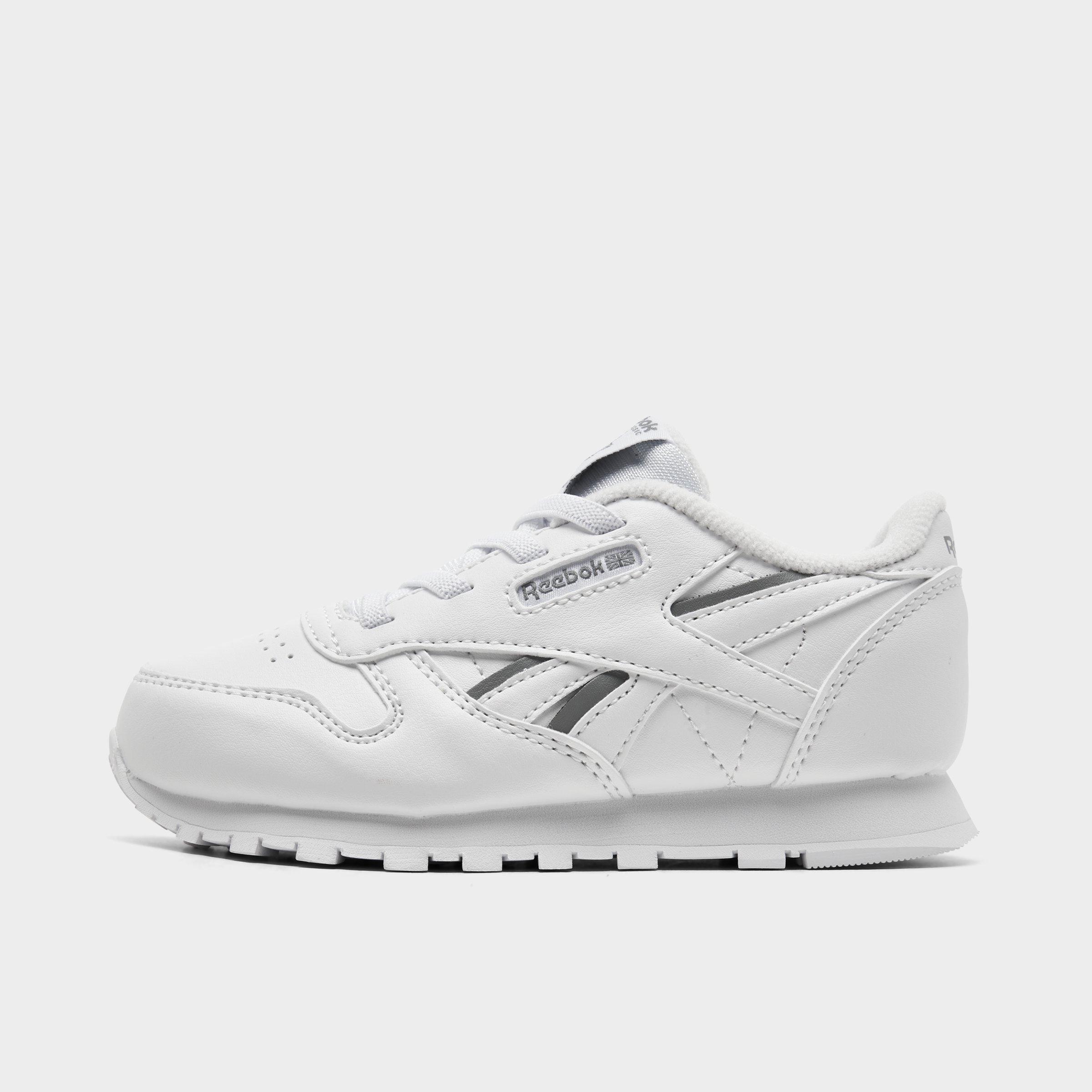 Reebok Shoes in White/White Size 8.0 Leather